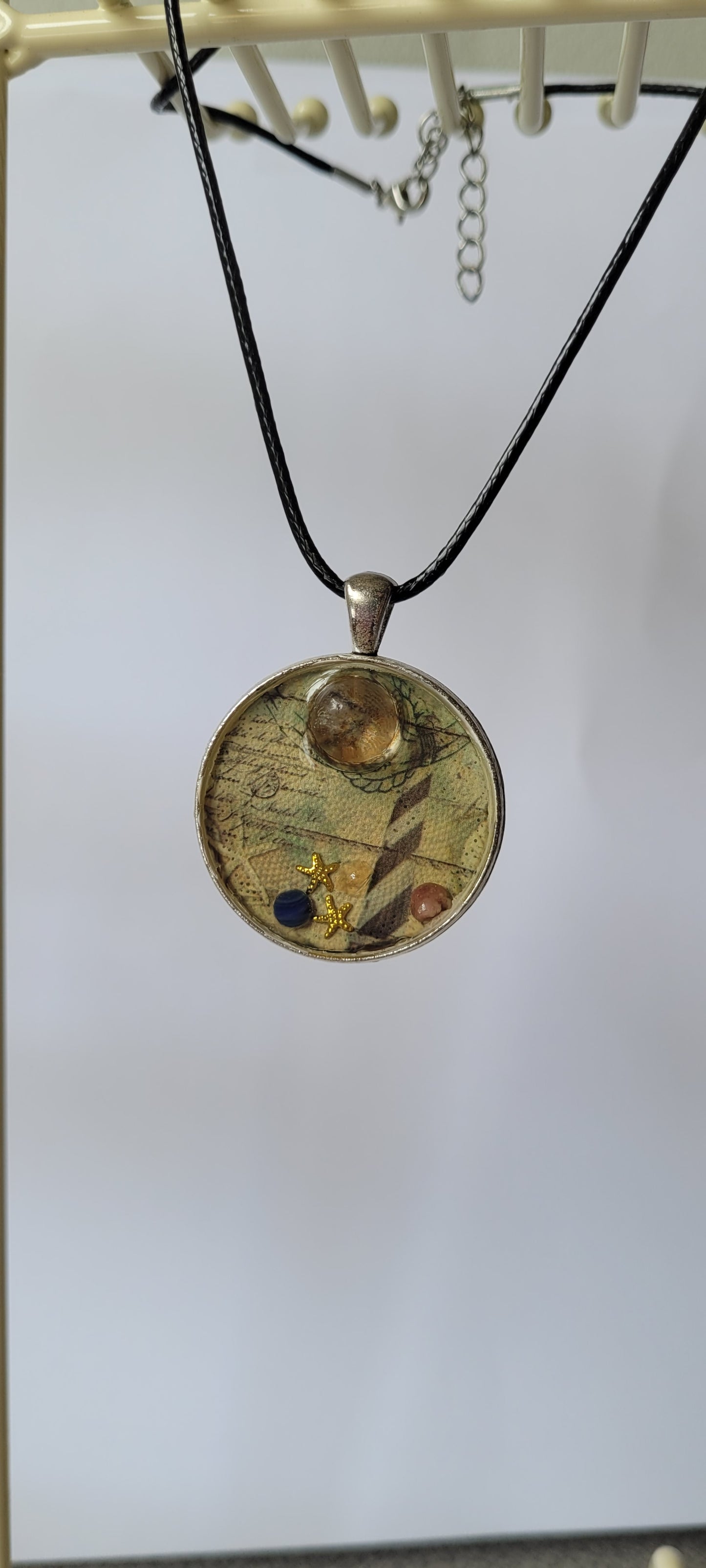 Lighthouse Handcrafted Amulet by Doe Zantamata