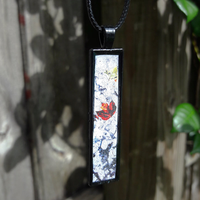 "The Beauty of Letting Go" Pendants by Doe Zantamata