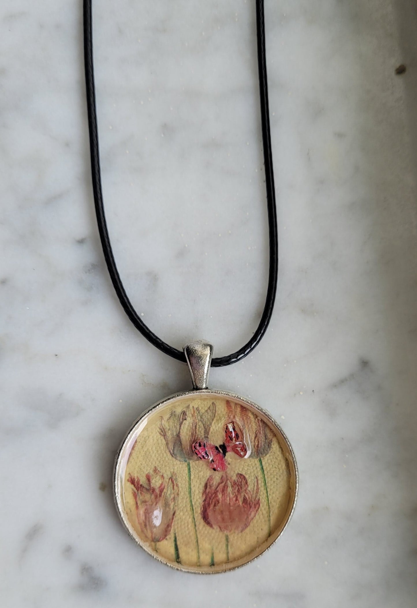 Butterfly in the Tulips Handcrafted Amulet by Doe Zantamata