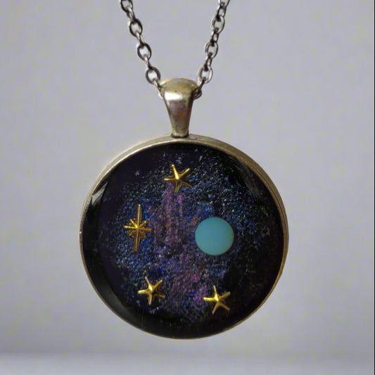 Necklace with a celestial pendant