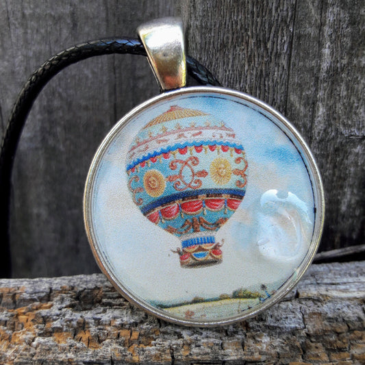 "Rise Above It" Amulet Pendant by Doe Zantamata
