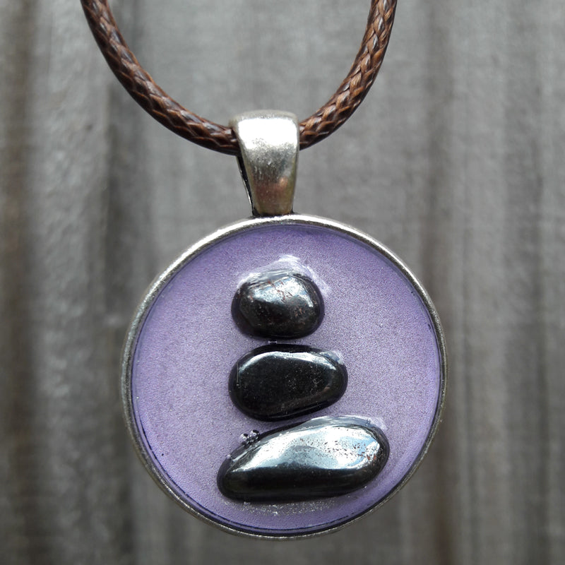 Hematite Cairn "Balanced Life" Amulets by Doe Zantamata