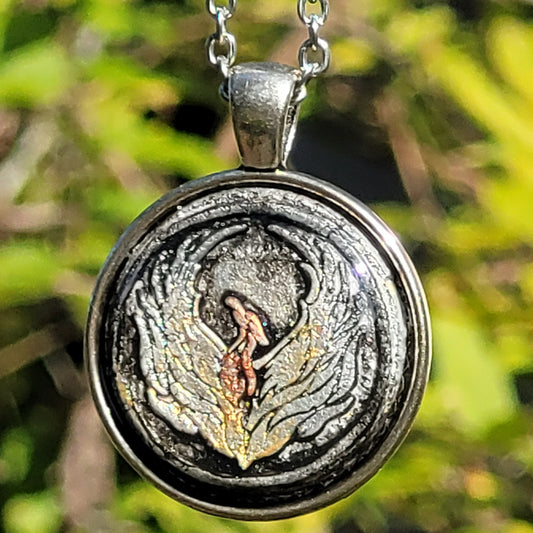 Phoenix Rising Amulet Pendant by Doe Zantamata